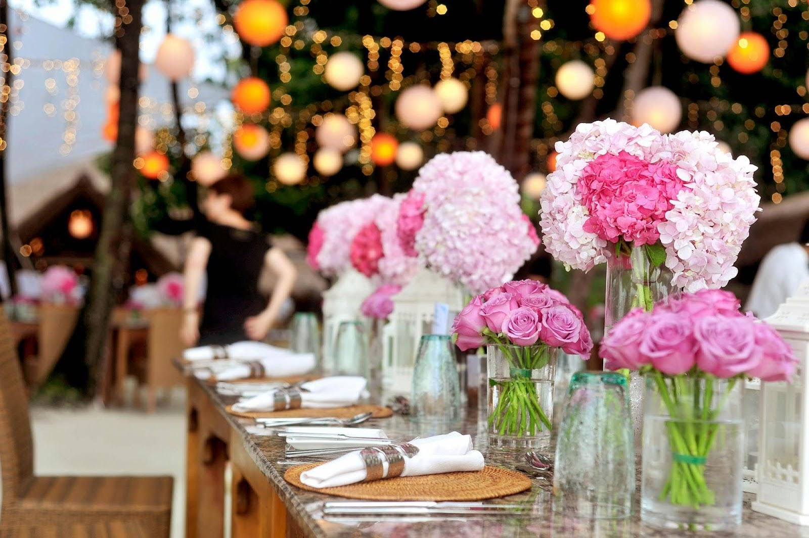 Elegant event setup with pink flowers and beautiful table arrangements