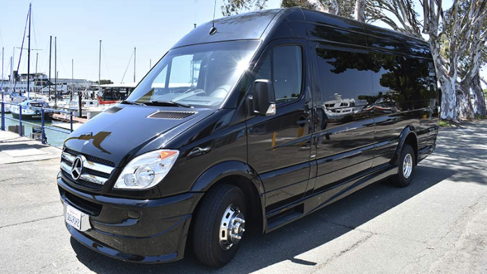Virtual terrarium workshop for remote teams with participants holding completed terrariums on video call.