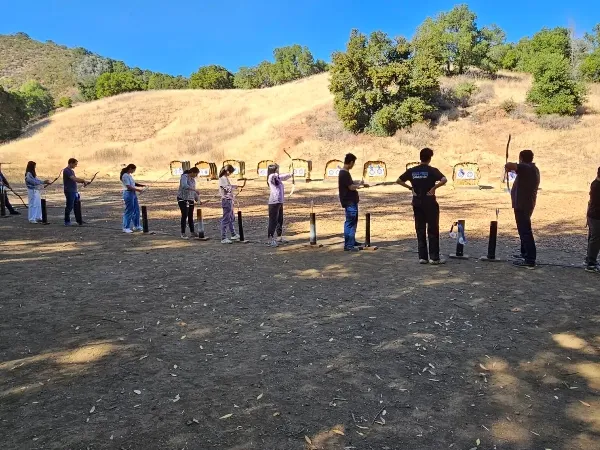 Corporate archery team-building session in Los Altos Hills with targets and instruction.