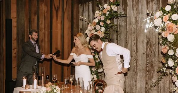 Guest speaking into a wireless handheld microphone at a wedding, from a Bay Area DJ's ceremony sound listing in Santa Cruz