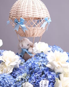 Baby Shower Floral Arrangement with Keepsake Balloon Centerpiece – Florists